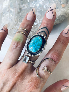 Size 7 adjustable Turquoise and Sterling Silver Ring